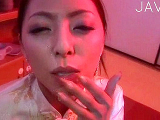 Asian fucktoy gulps down a load of jizz